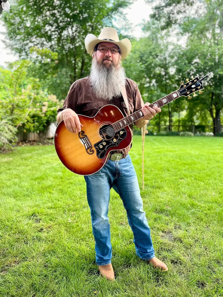 Jason Wilkerson with his guitar